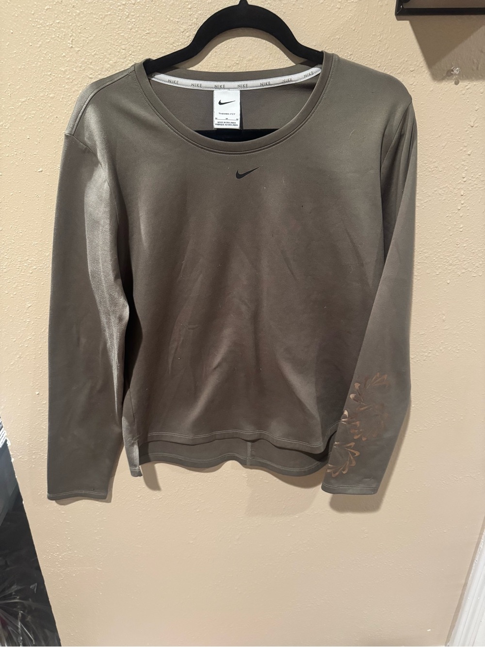 Nike Women's Olive Green Crewneck Sweatshirt with Subtle Sleeve Detail